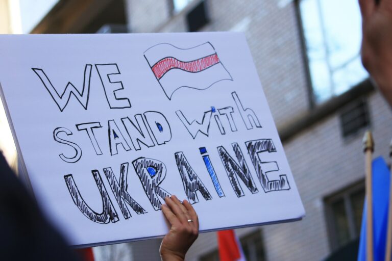 Protesters Want Aid to Ukraine Photo by Tong Su on Unsplash
