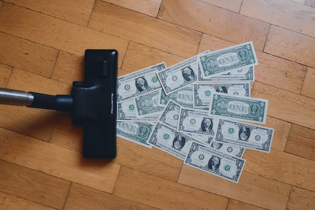 Inflation sucks up money in vacuum Photo by regularguy.eth on Unsplash